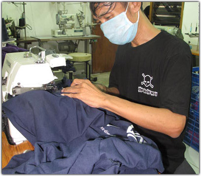 Welly sewing a t-shirt